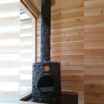 Дровяная печь для сауны IKI Loyly со стальной дверкой смайл Дровяная печь для сауны IKI Loyly со стальной дверкой смайл
